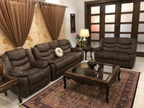 MJS Entire New Designer House, 5 BR, 13 bed, 2 living, reclining sofas, Italian kitchen, 6 bath, garage, side garden at prime location of Bahria Town, Islamabad